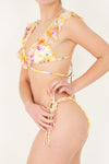 Bikini croisé à motif fleuri et volants